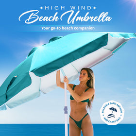 AMMSUN sand anchor in use secures the umbrella on windy sand