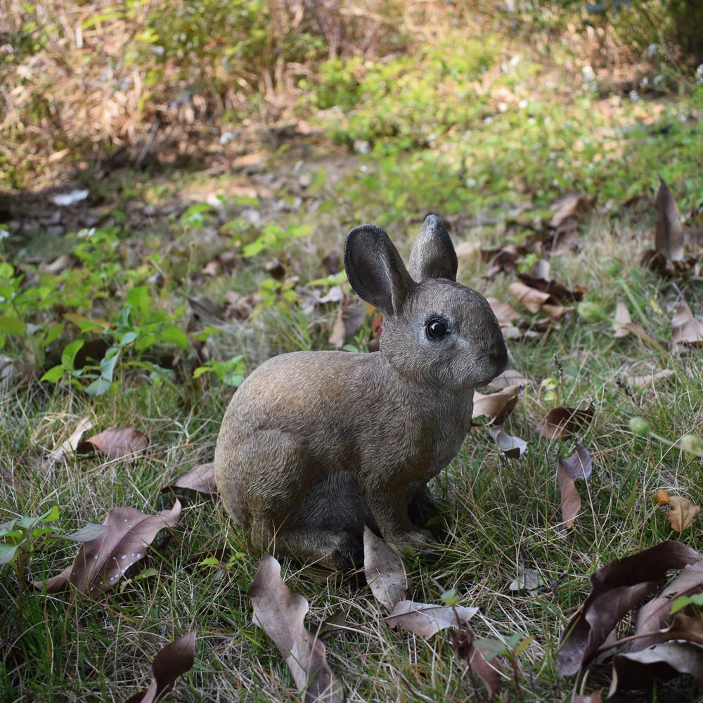 andady Rabbit Resin Garden Statue on patio complements plants and seating areas