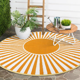 Anidaroel foldable rug with carry bag and stake loops for secure outdoor use.