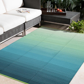 Anidaroel Ombre outdoor rug blue-green on patio adds style and durability