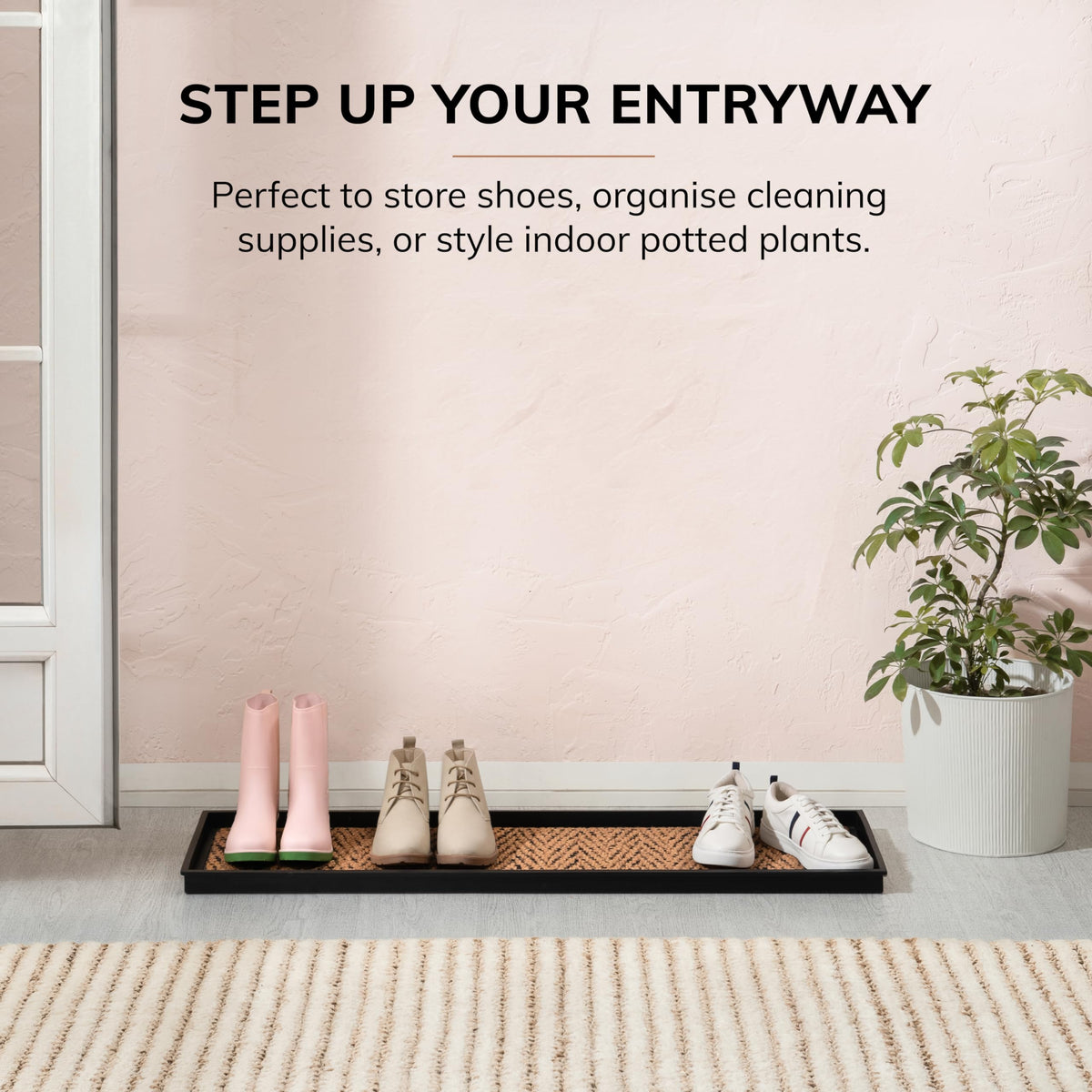Anji Mountain rubber tray in black supports durable, easy-care entryway use.