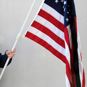 Anley half-mast display setup ready on outdoor flag.