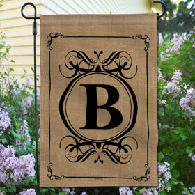 Anley welcome home garden flag with bold initial to enhance curb appeal.