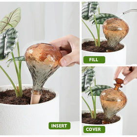 Ansberta ceramic spikes inserted into soil for controlled hydration