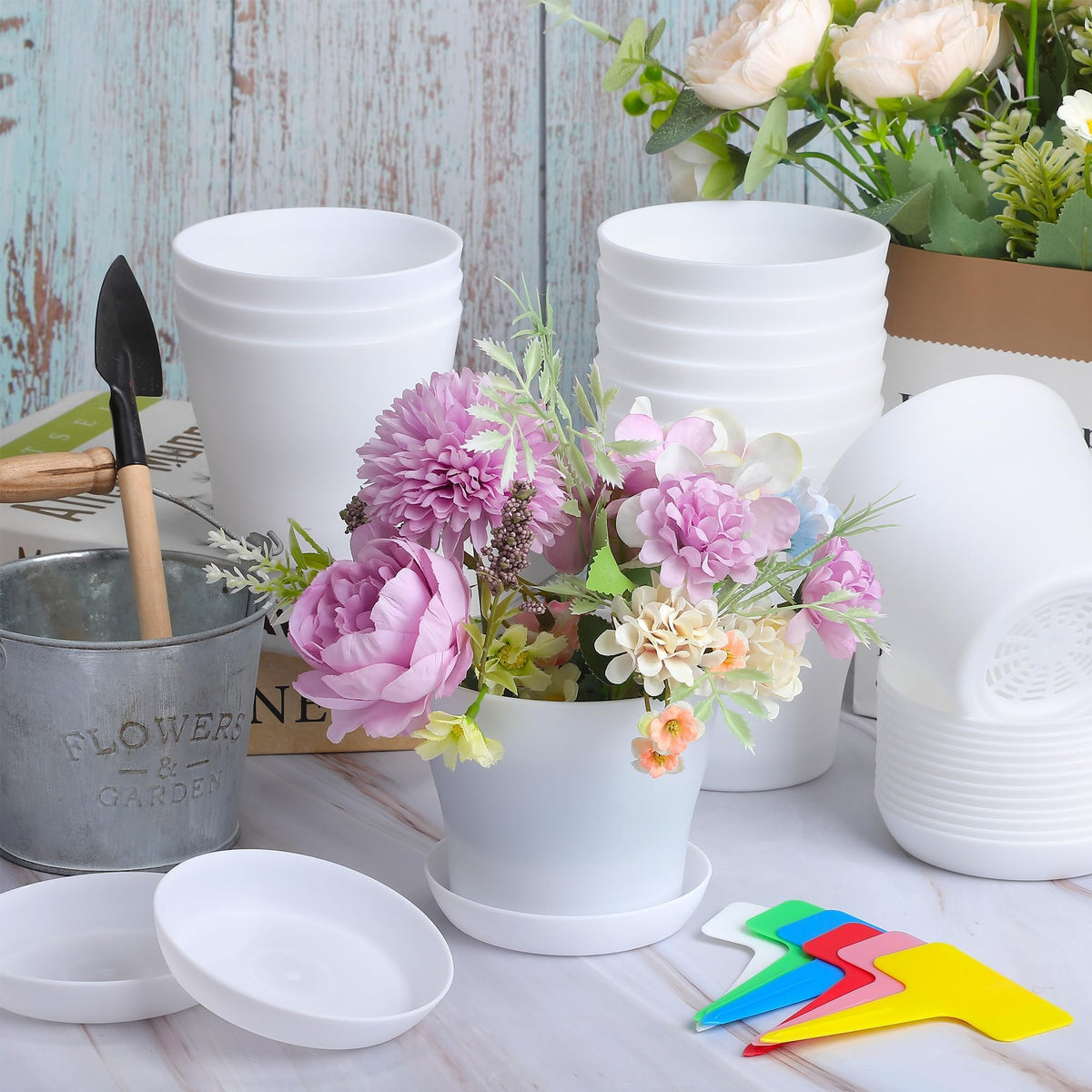 Aodaer white planter trays keep pots stable and mess-free.