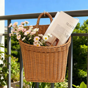 Aodse remote-holder basket for living room keeps remotes tidy.