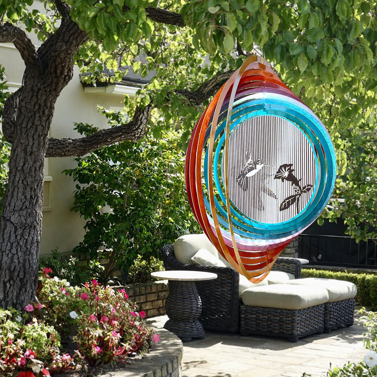 Aoedelyart 3D hummingbird wind spinner side view adds kinetic charm.