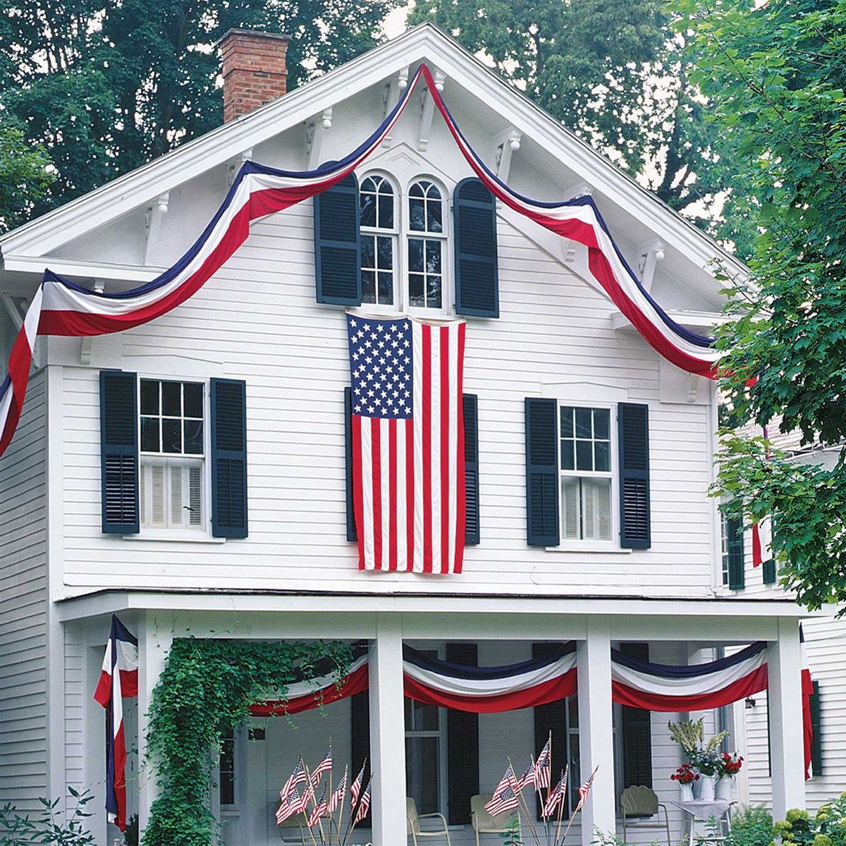 Aokansha large bunting drapes over a railing for Independence Day.