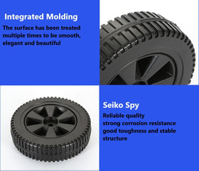 Durable plastic wheel with black tire tread supports outdoor grilling on uneven surfaces.