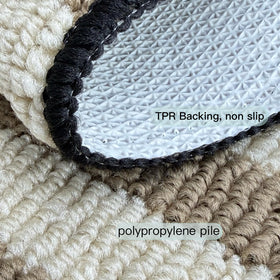 AOUER door mat with khaki stripe pattern hides dust at doorway.