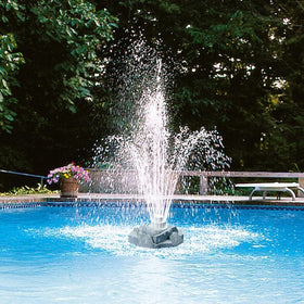 Aqua Select grey rock floating pool fountain, enhances ambiance and cooling water.
