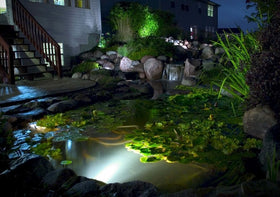Aquascape bronze-finish submersible spotlight for durable outdoor lighting.