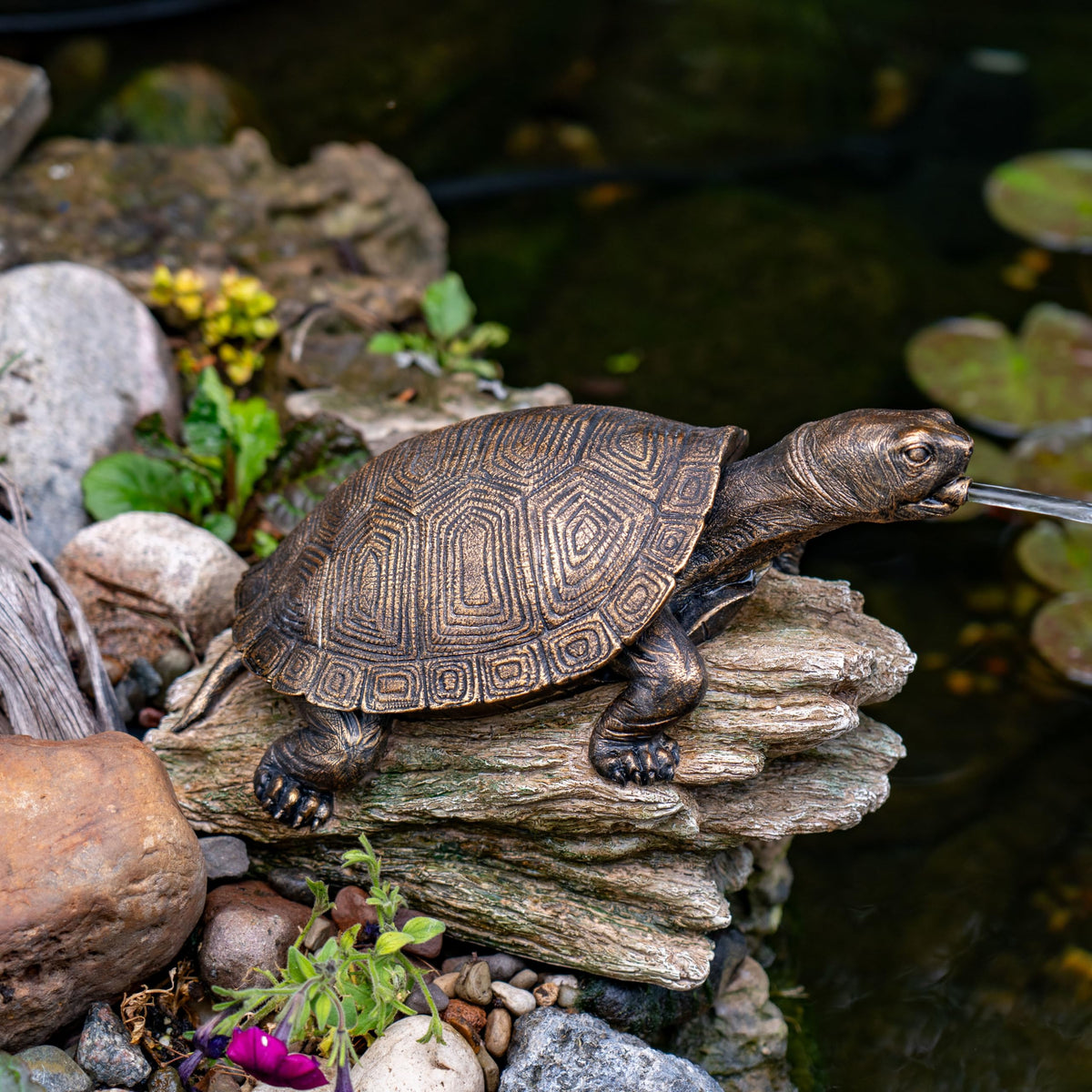 Aquascape Turtle on Log Spitter minimum pump 90 GPH recommended.