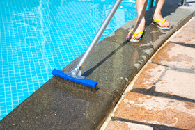 Aquatix Pro brush with aluminum handle reaches under ladders for easy cleaning.