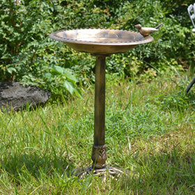 Arcadia Bronze Bird Bath with stakes included for added outdoor stability.