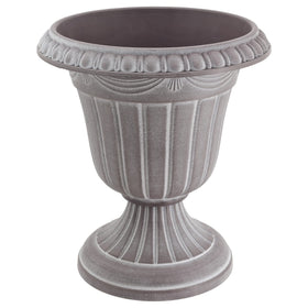 Arcadia urn features fluted design and ornamental rim for refined porch charm.