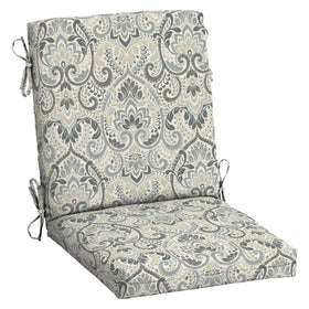 Arden Selections Aurora Damask chair cushion on a dining chair for comfortable outdoor meals.