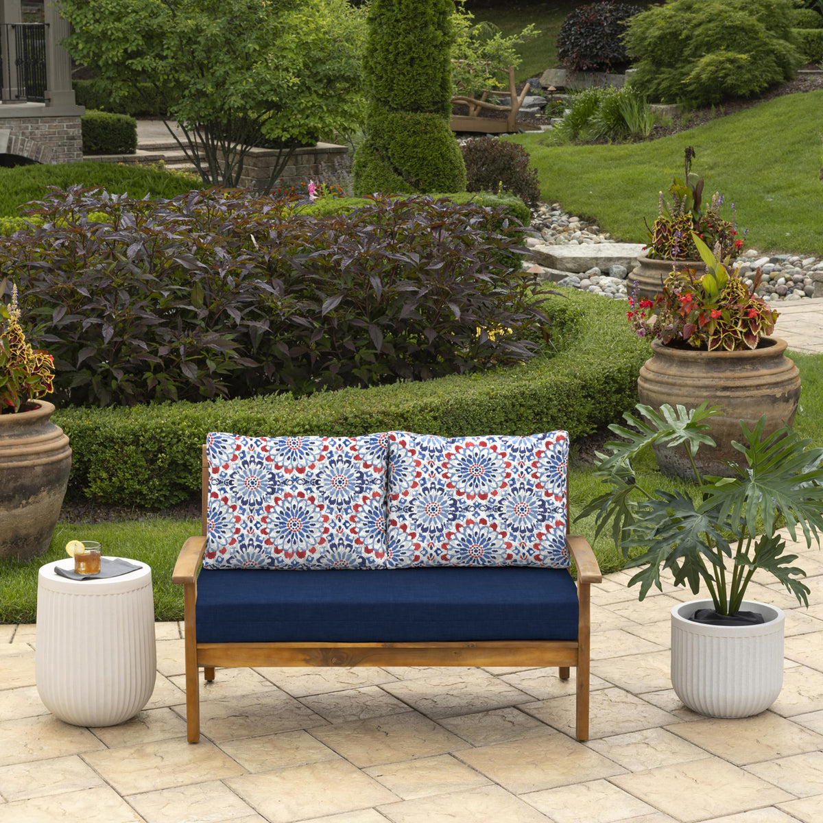 Arden Selections Clark Blue back pillows offer plush porch support