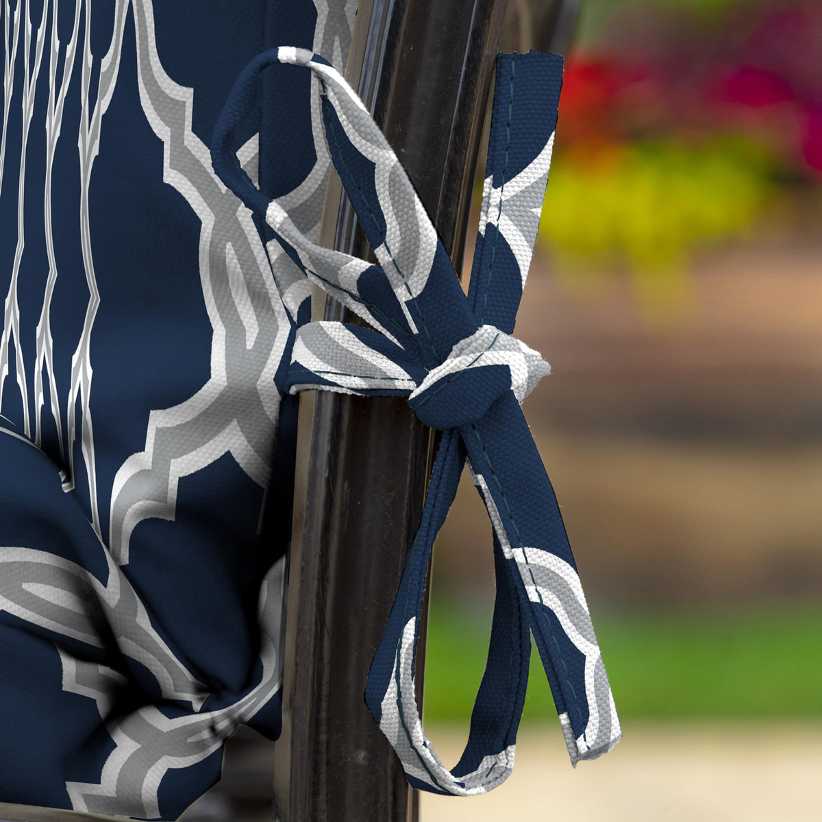 Arden Selections earthFIBER sapphire-blue cushion demonstrates fade resistance in sunlight
