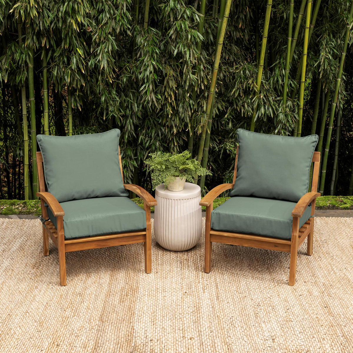 Arden Selections EarthFIBER cushion in sage green texture complements outdoor seating.