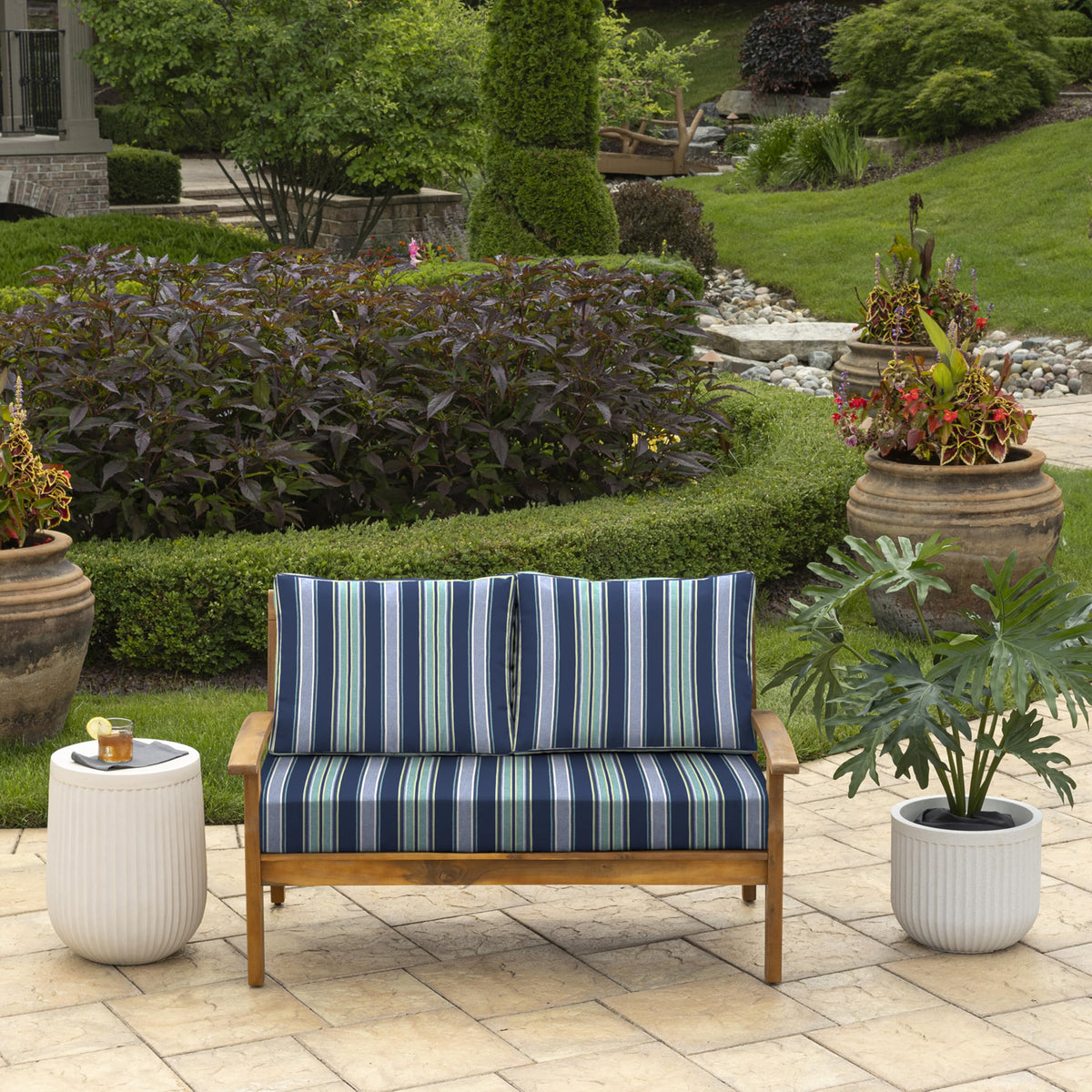 Arden Selections back pillows 24x18 provide plush support for outdoor seating.