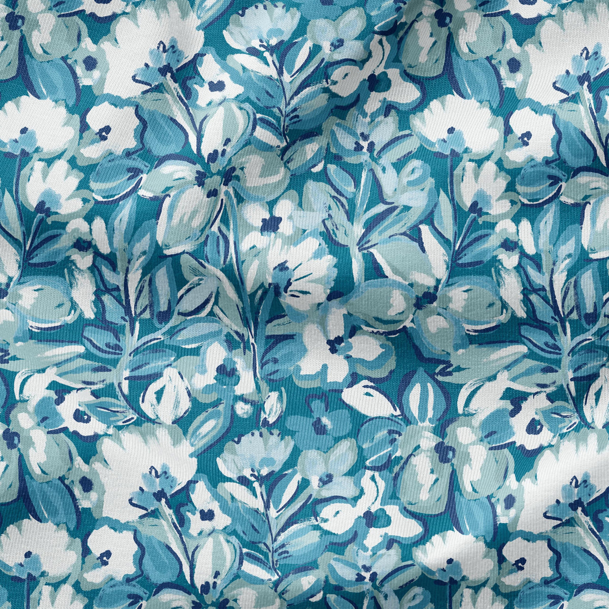 Fade-resistant Aqua Blue Fusion Floral Arden cushion under sunlit patio