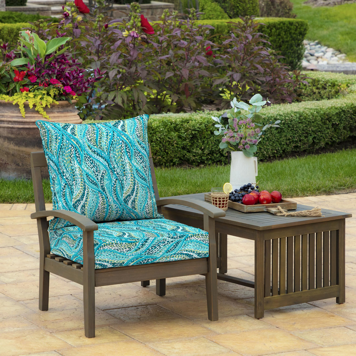 Arden Selections cushion side view in teal Ariel highlights slim profile.
