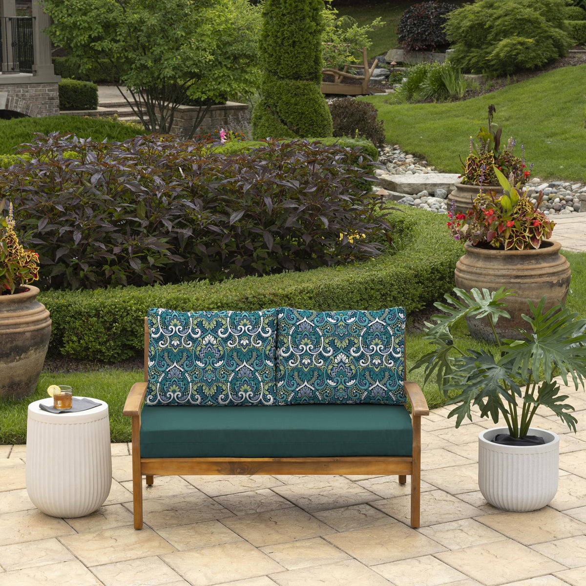 Arden Selections back pillow highlights the damask pattern for elevated outdoor decor
