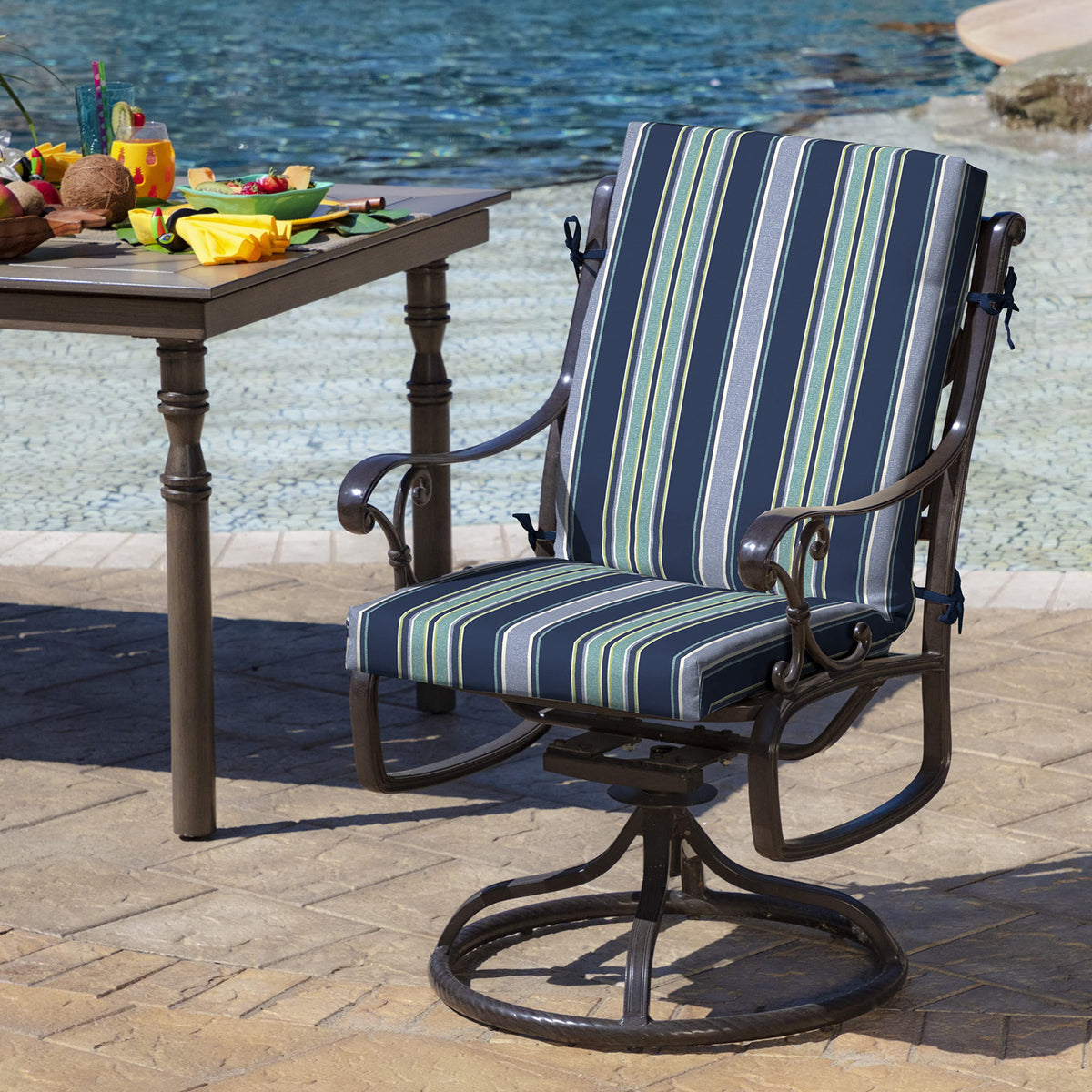 Arden Selections cushion in Sapphire Aurora Blue Stripe adds color to outdoor dining spaces.