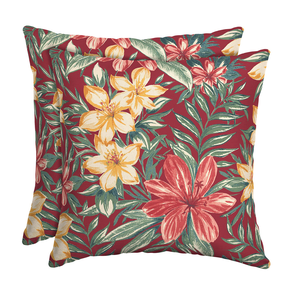 Arden Selections outdoor toss pillow Ruby Clarissa on a patio chair for vibrant, fade-resistant decor.