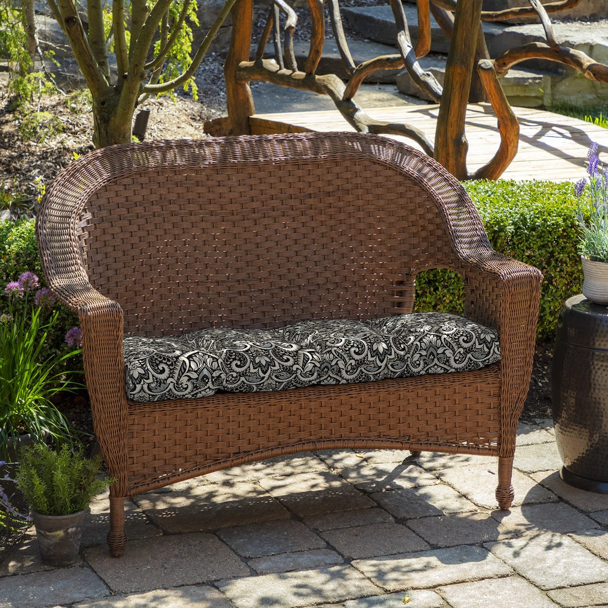 Arden Selections cushion in Black Aurora Damask enhances outdoor seating with durable style