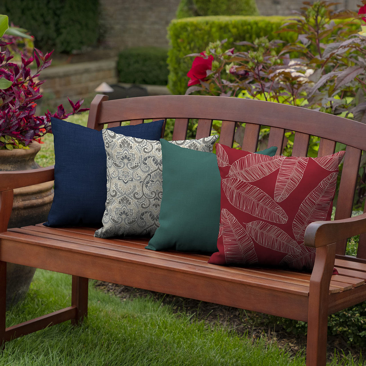 Arden Selections red leaf palm outdoor cushion showing eco-friendly recycled fill
