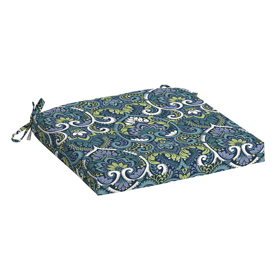 Arden Selections Sapphire Aurora Blue Damask seat cushion on a chair for indoor-outdoor comfort.
