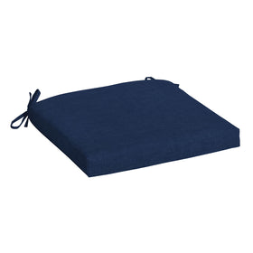 Arden Selections sapphire blue chair cushion on a chair for indoor and outdoor use