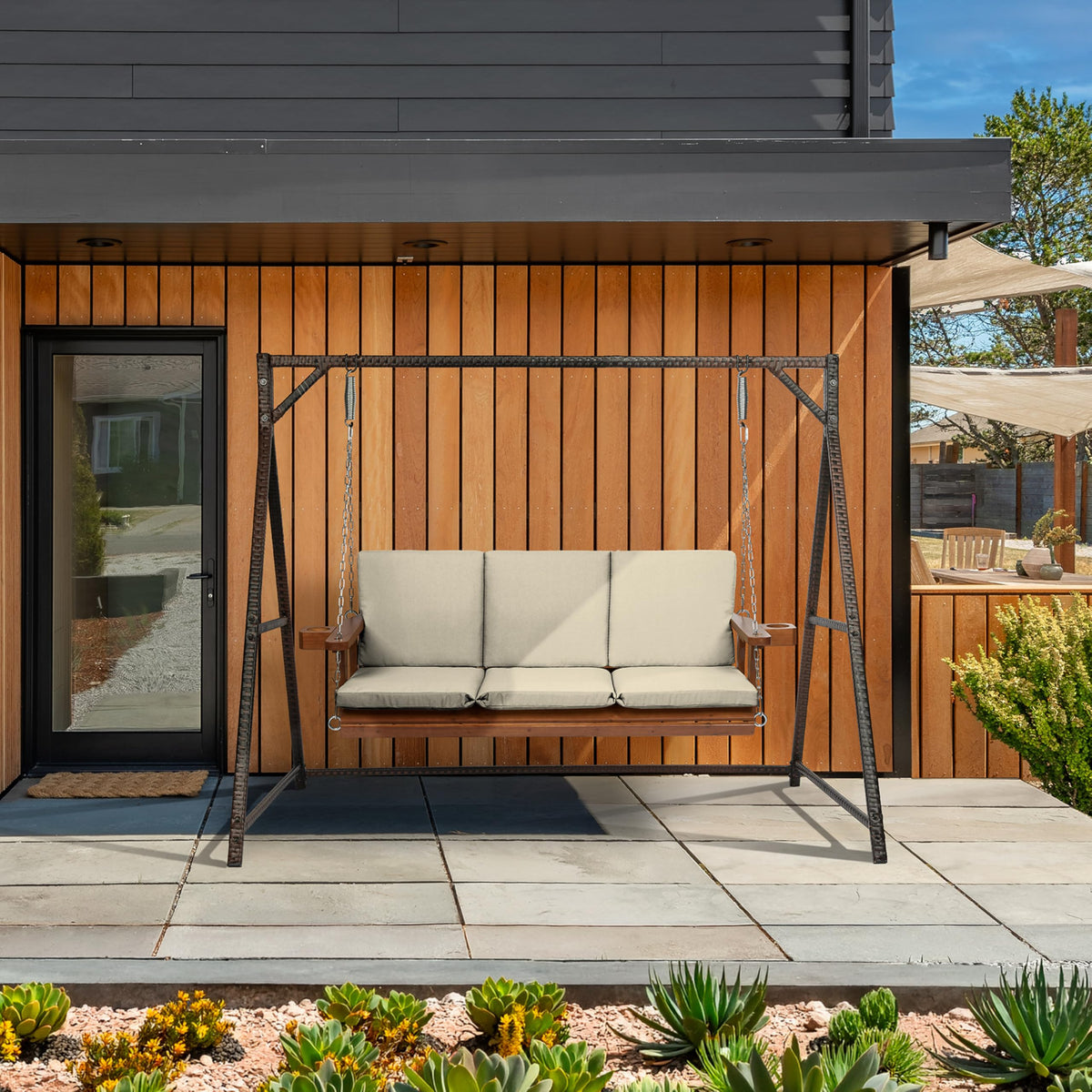 Arden Selections swing cushion back resting on a garden bench for support.