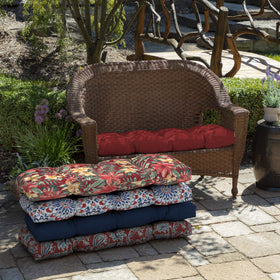 Arden Selections cushion on wicker settee with two secure ties