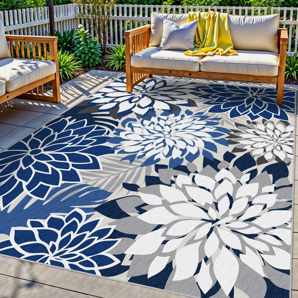 Arenarug floral pattern outdoor rug in blue enhances patio spaces with vibrant, weather-friendly style.