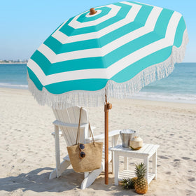 AreShark blue and white stripe umbrella enhances beach or poolside shade
