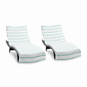 Arkwright Las Rayas chaise lounge cover with pocket keeps towels in place on pool chairs.