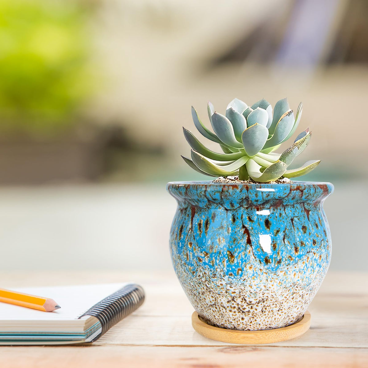 ARTKETTY succulent pots 4-pack on desk setup ideal for windowsill decor.