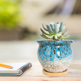 ARTKETTY succulent pots 4-pack on desk setup ideal for windowsill decor.