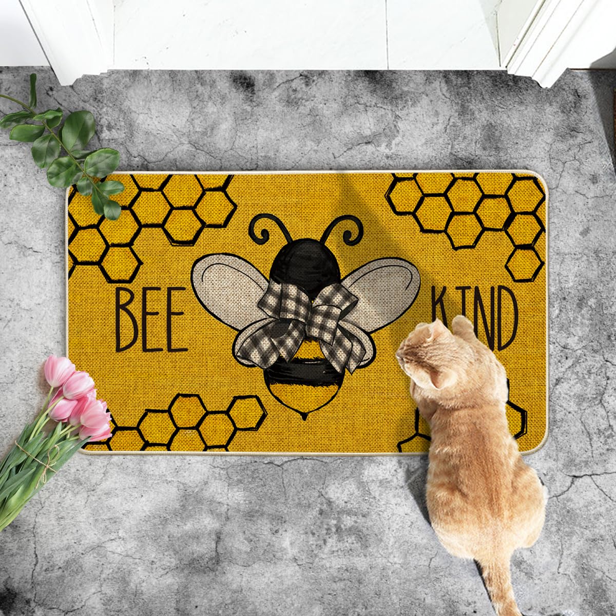 Artoid Mode Bee Kind Doormat with non-slip bottom protects floors and prevents slipping.