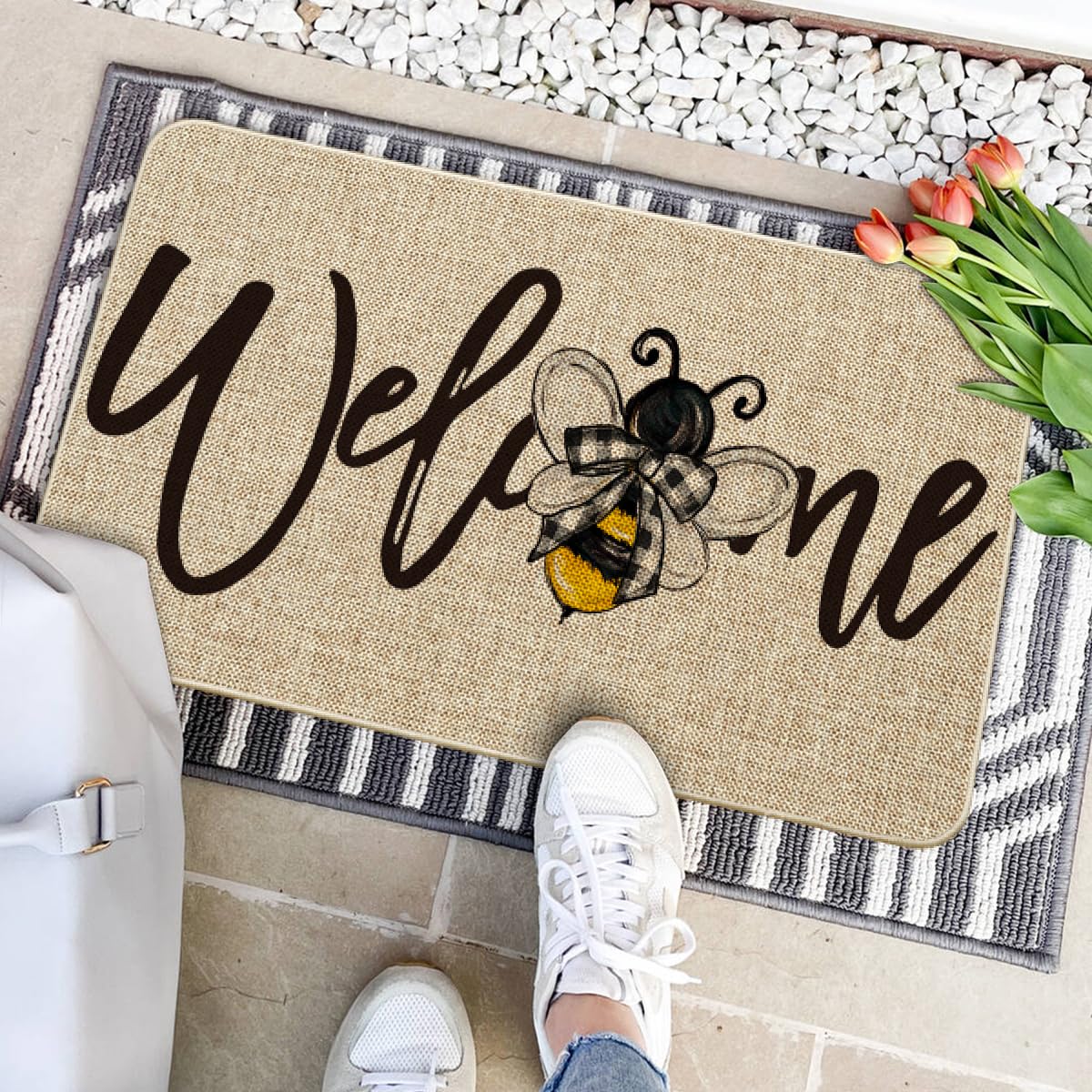 Artoid Mode Welcome Spring doormat features non-slip rubber for safer entry.