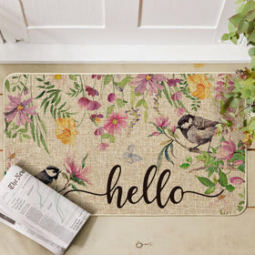 Artoid Mode doormat featuring birds and flowers adds bright spring curb appeal.