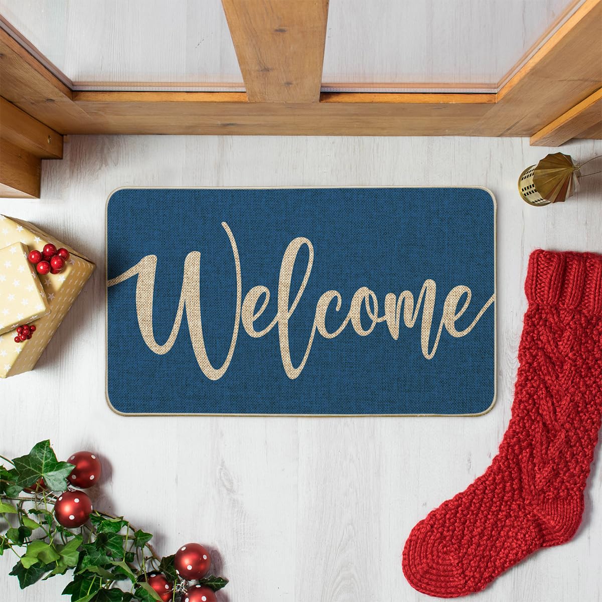 Artoid Mode Blue Welcome Winter Doormat enhances entryway decor with a seasonal touch.