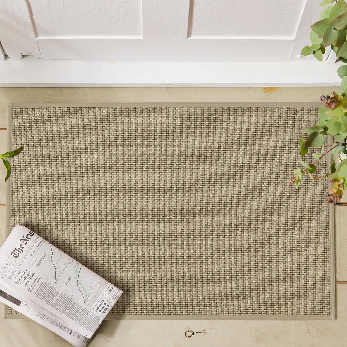 Artoid Mode chenille kitchen mat in front of sink cushions feet and absorbs spills.