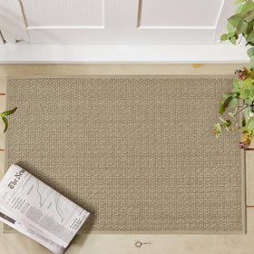 Artoid Mode chenille kitchen mat in front of sink cushions feet and absorbs spills.