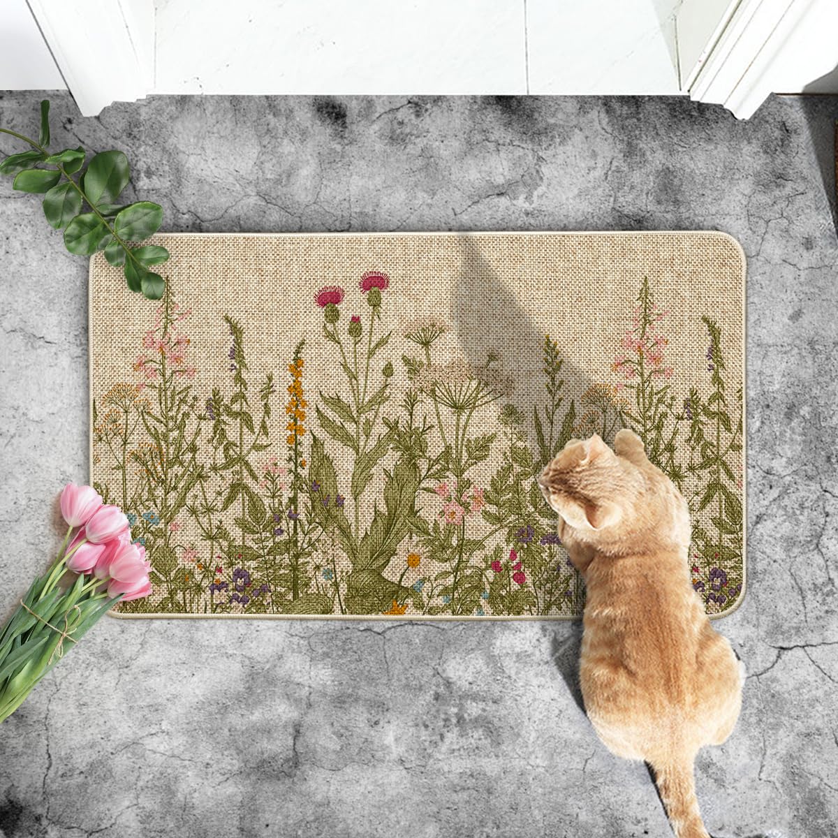 Artoid Mode doormat being rinsed clean with hose or sponge for easy maintenance