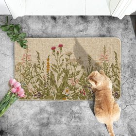 Artoid Mode doormat being rinsed clean with hose or sponge for easy maintenance