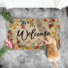 Artoid Mode welcome mat features non-slip rubber backing for secure placement on dry or wet days.